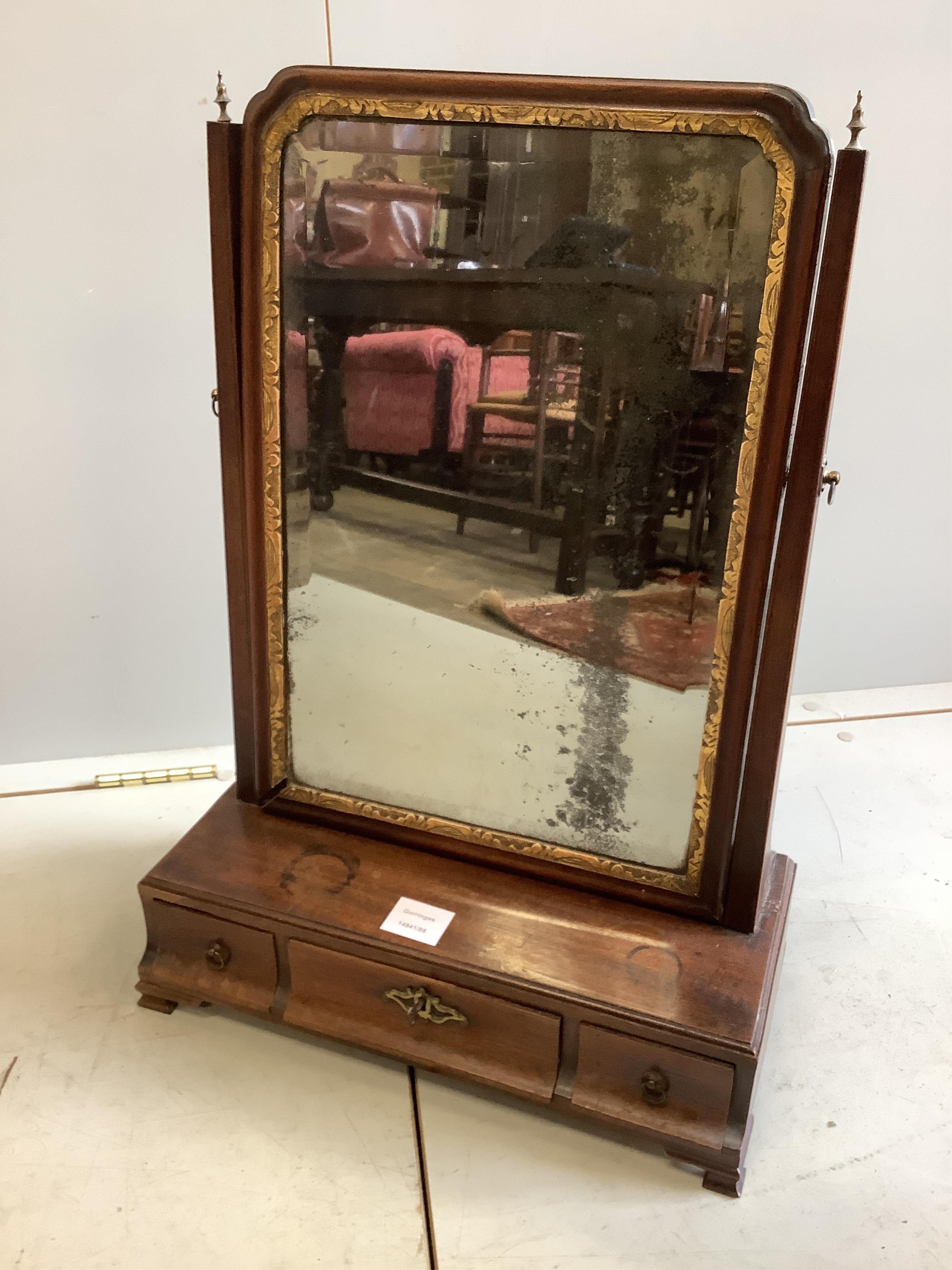 A George III mahogany box base swing frame three drawer toilet mirror, width 43cm, depth 19cm, height 60cm. Condition - fair